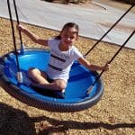 Girl on a swing at Friendship Park