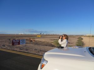 Kay Nicholson conducting a bird point count survey at the Phoenix Goodyear Airport.